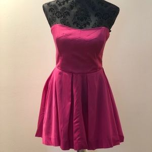 Pink strapless dress from “French Connection”